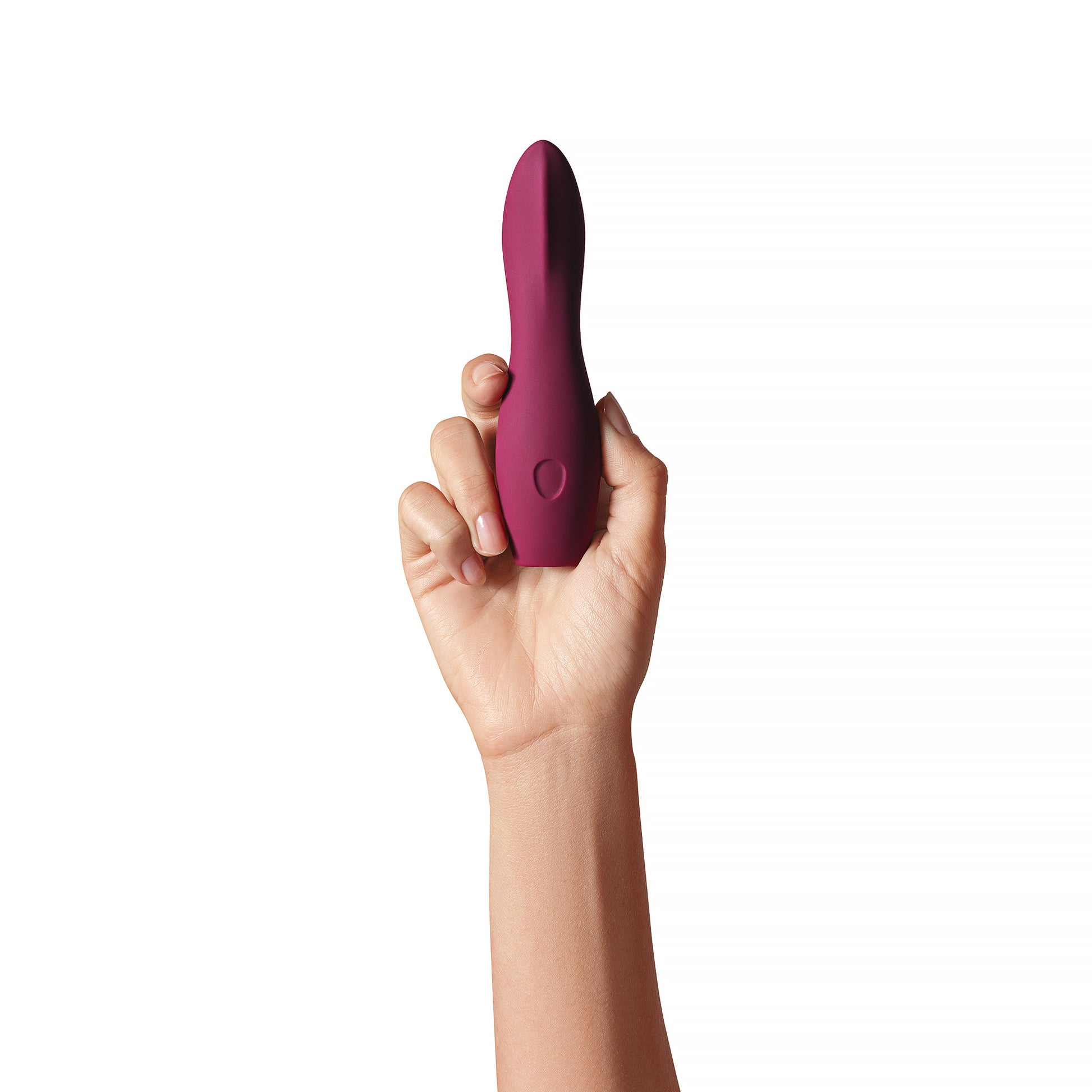 dip 2.0 di Dame, vibratore viola piccolo in silicone medico tenuto in mano